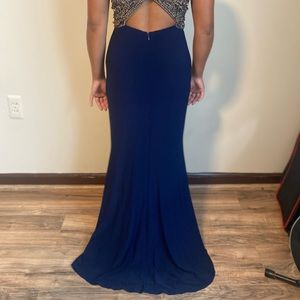 Elegant gown with gold beading.